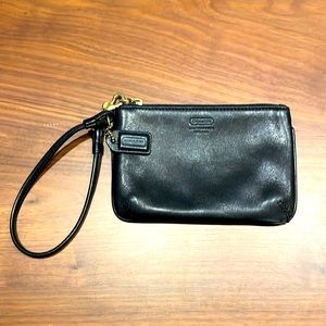 Black leather wallet-wristlet.